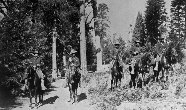 African American soldiers on horseback at Yosemite National Park, 1899.