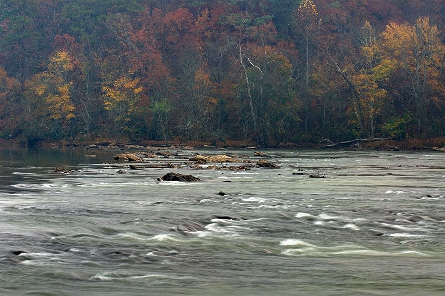 Fall colors showing through a morning fog. Looking at the shoals at the Palisades.