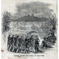 Historical illustration from Harper's Weekly November 8, 1862 showing the C&O Canal parallel to the river and a regiment passing through a culvert under the canal at Hancock on their way to the ford.