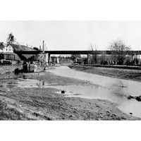 After the breach of the canal, boats sit in mud as the water drained out.