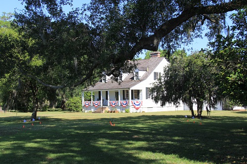 Historic house with oak trees