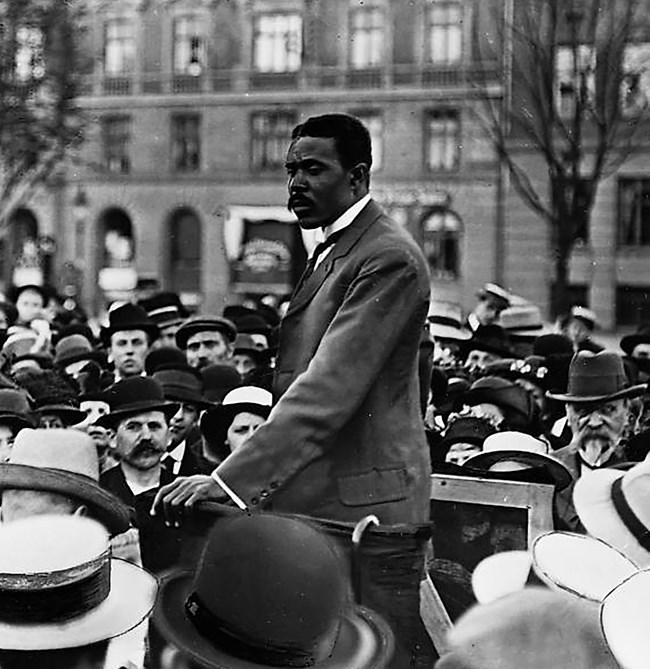 Photograph of David Hamilton Jackson giving a speech to a crowd in Denmark, 1915.