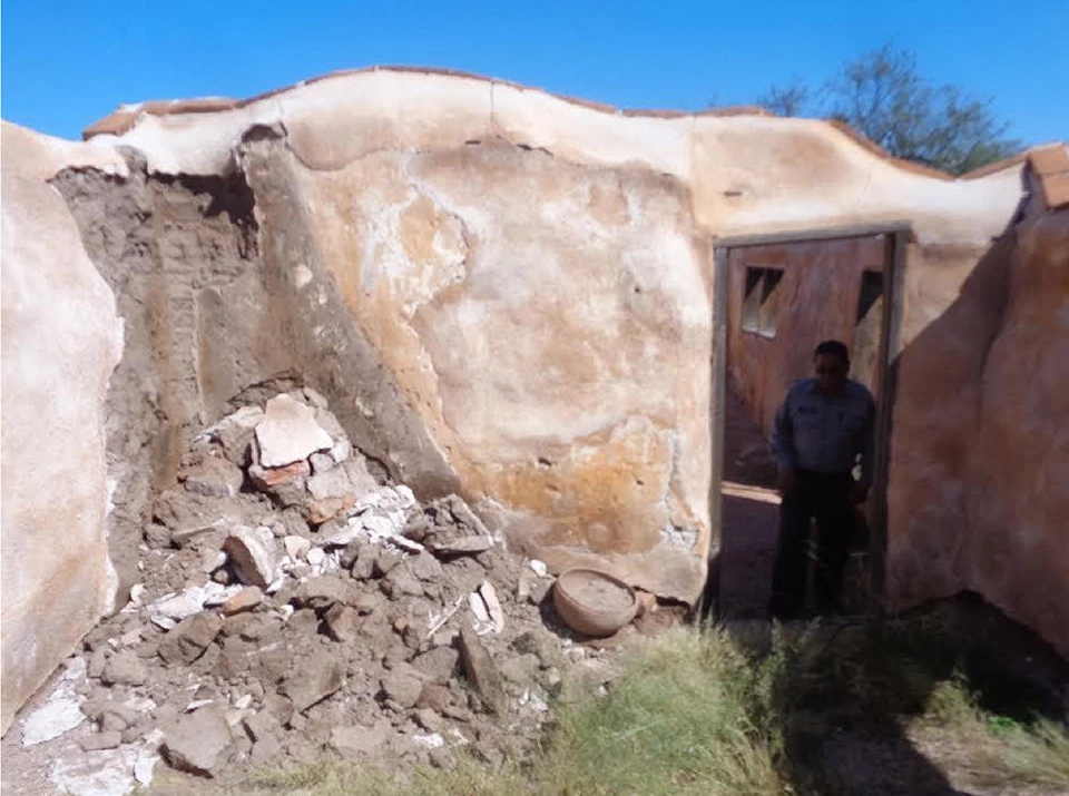 Adobe wall with fireplace