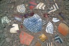 Pottery sherds, each with different colors and patterns