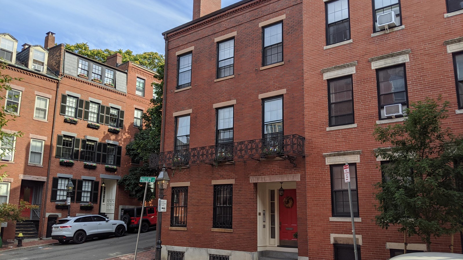 Three story brick dwelling.