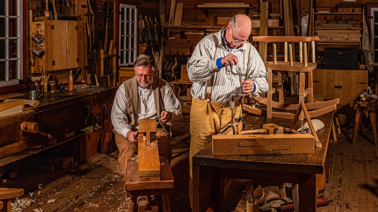 Two carpenters working in the Fort Vancouver Carpenter Shop.