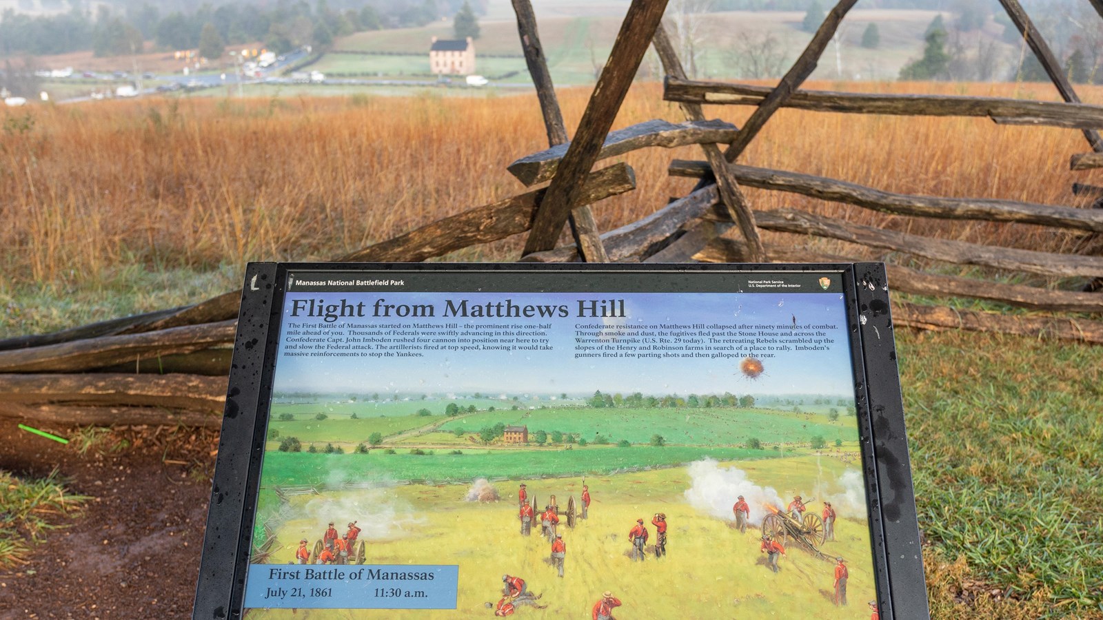 Information panel looking northward towards Matthews Hill in the distance