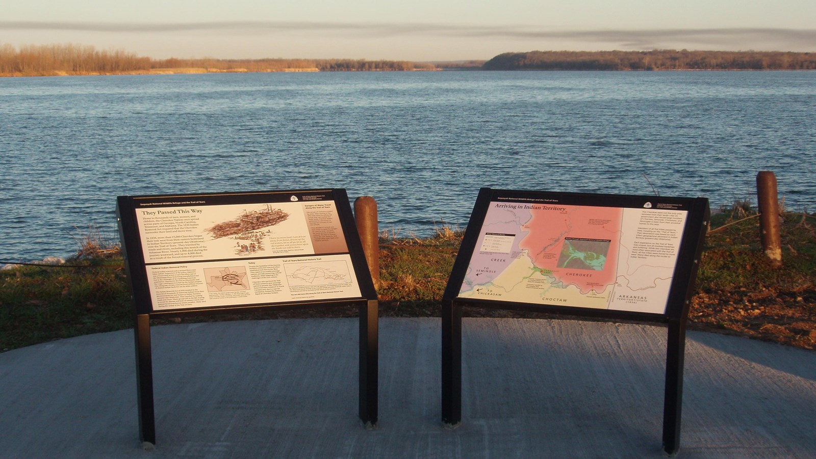 Two interpretive waysides on the bank of the Arkansas River in Sequoyah National Wildlife Refuge OK