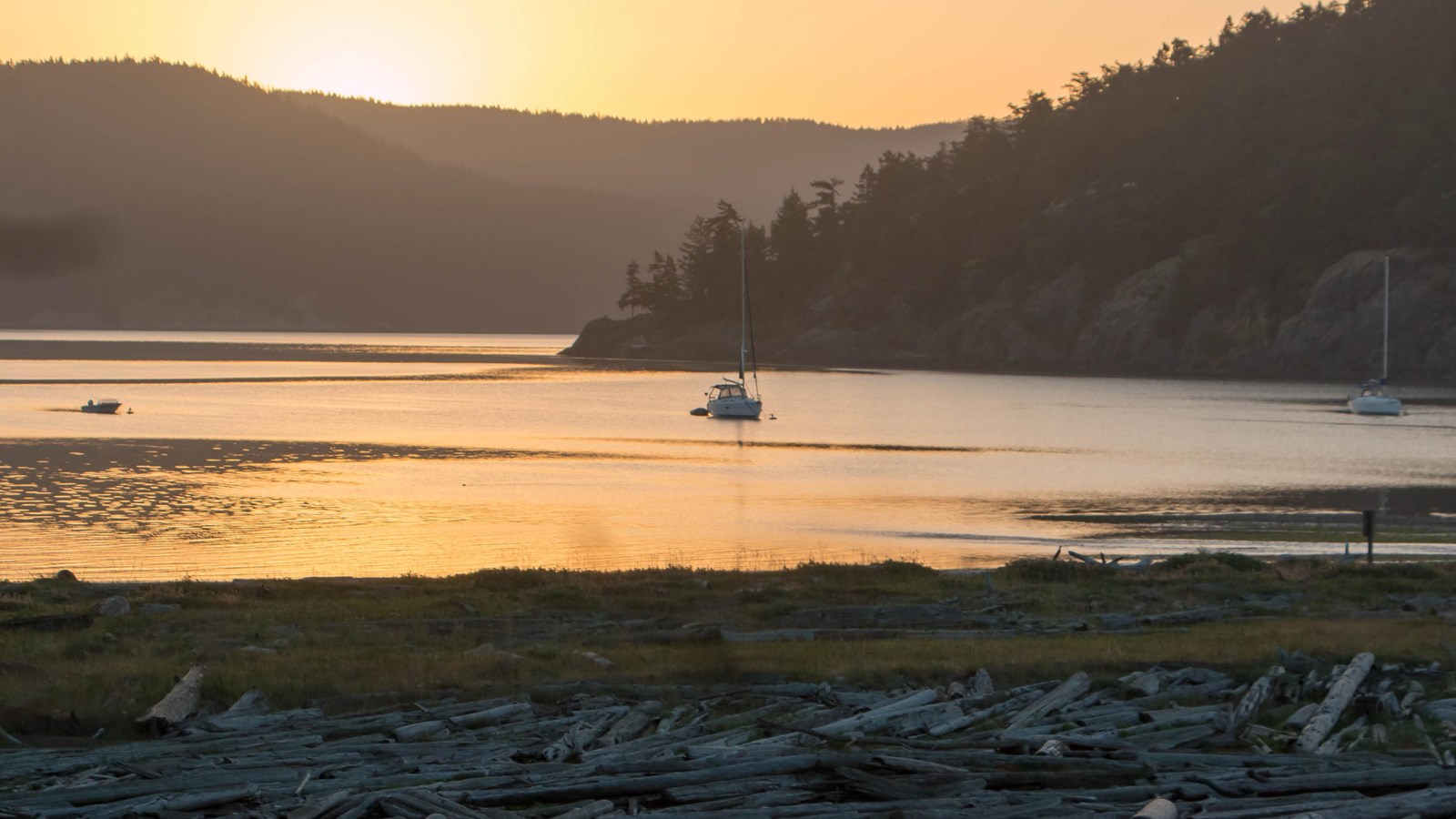 A rocky beach at sunset