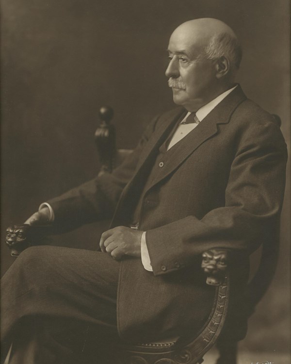 man in suit poses for a portrait