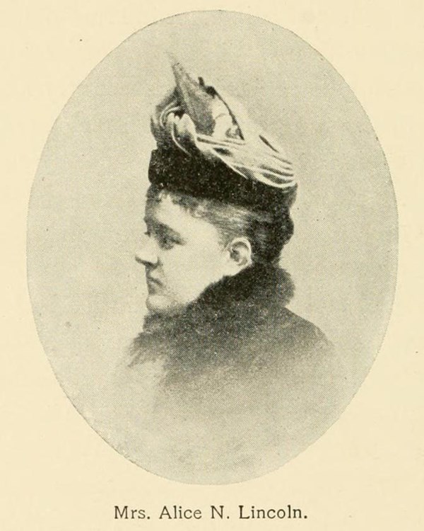 side profile of a woman wearing a hat