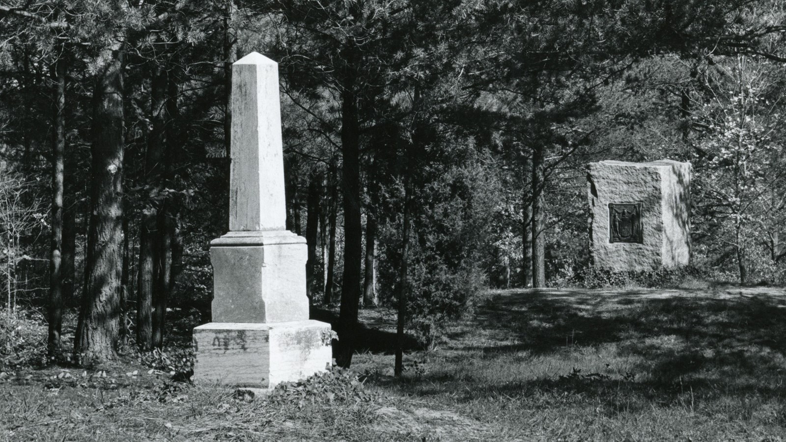 In the foreground the narrow Delaware Plinth contrasts the large squat Maryland monument behind it.