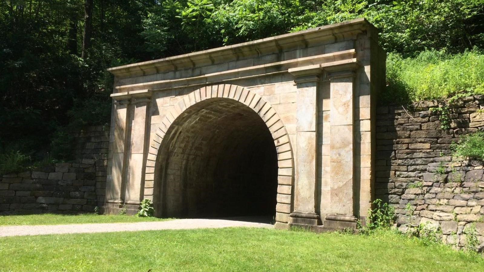 A railroad tunnel made of stone