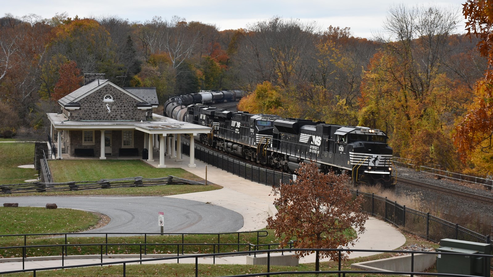 outdoors, trees, building, railroad tracks, freight train