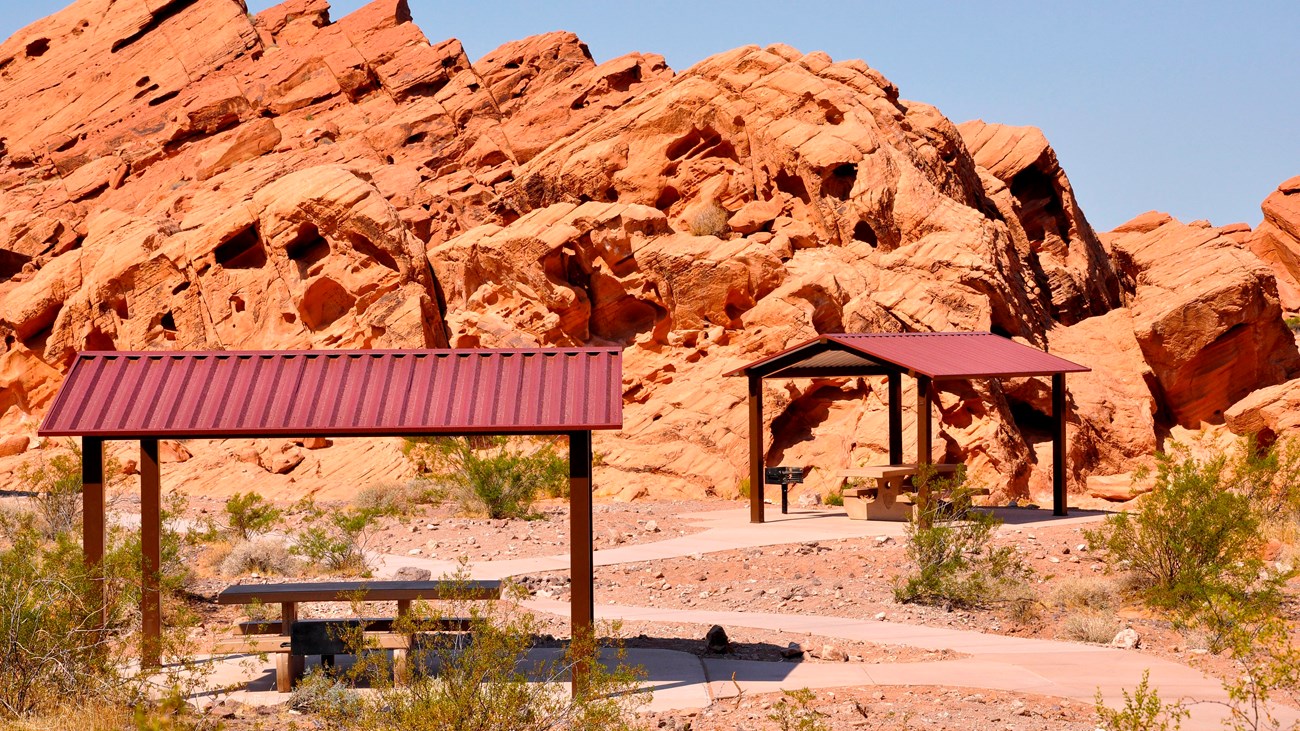 Picnic shelters in a red rock area