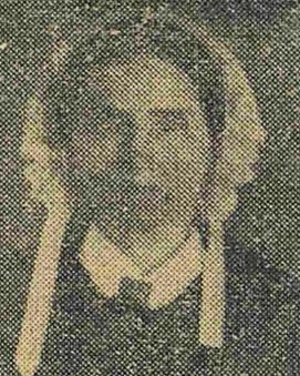 Scanned black and white newspaper picture of Elizabeth Hanks