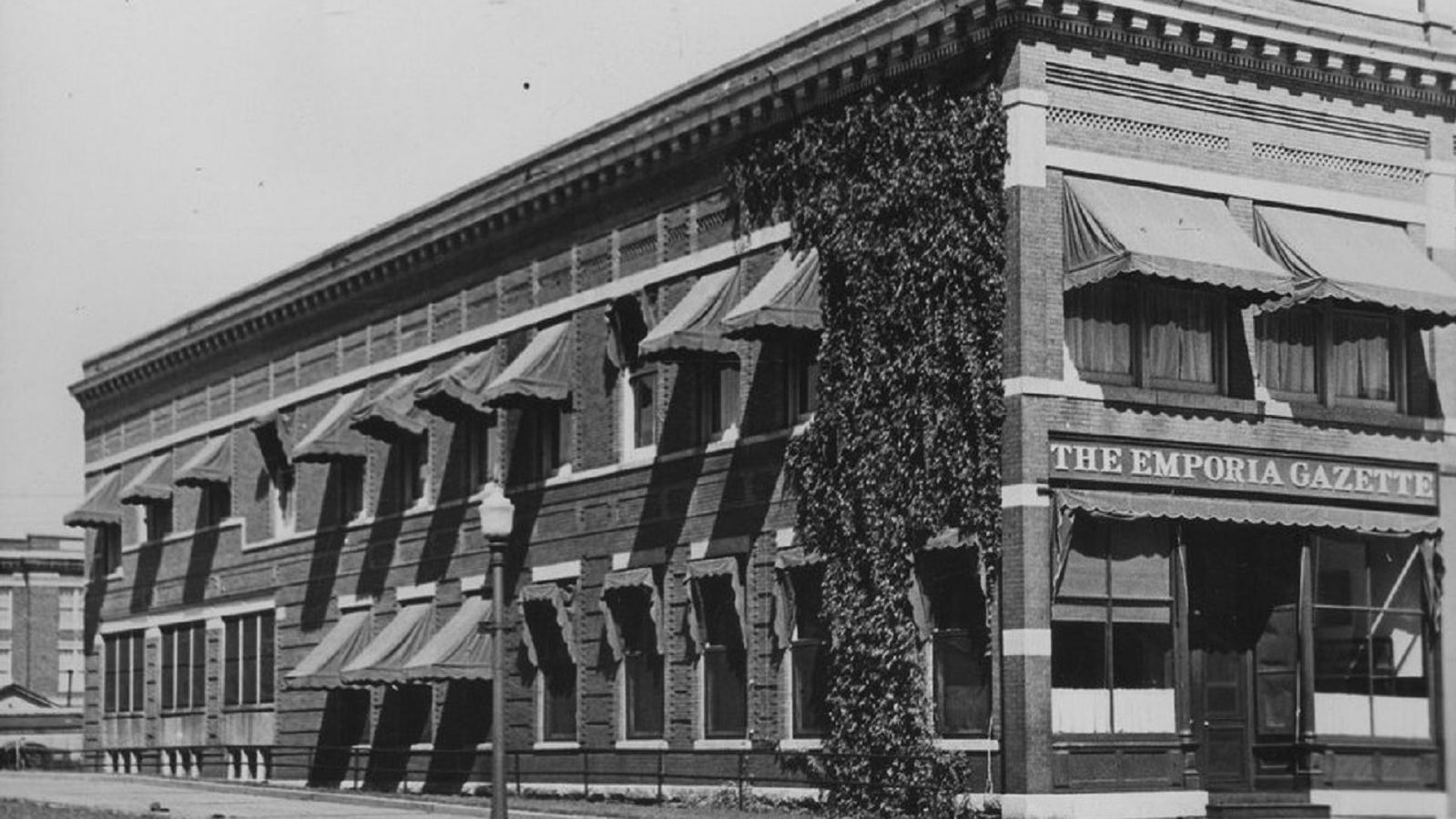 A black and white photo of the office of the Emporia Gazette newspaper company.