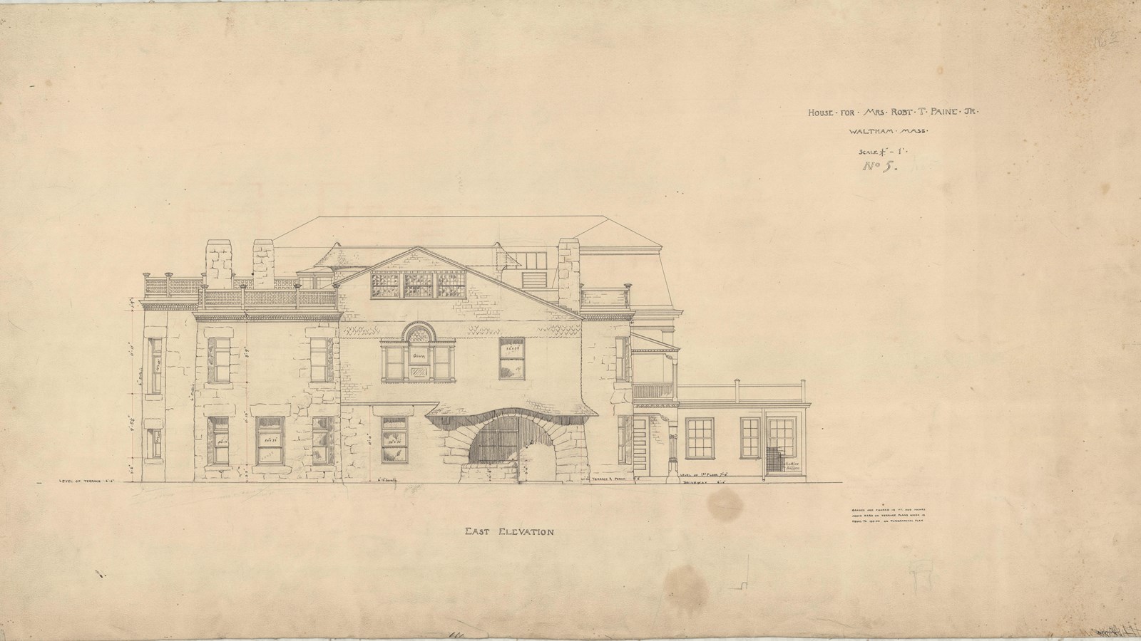 Pencil plan of large home of brick with large arch over the door 