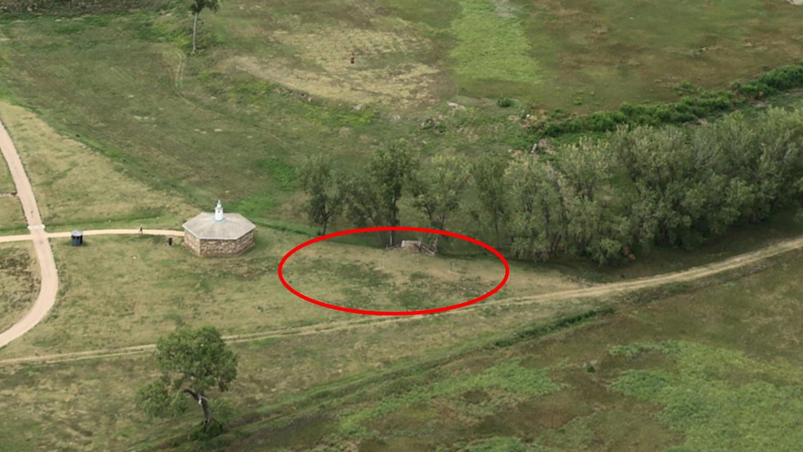 Aerial view of the History & Nature trail with stables & dugout location circled in red.