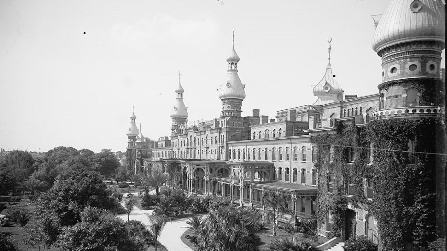 Large building with four towers topped with onion domes regularly spaced and many windows