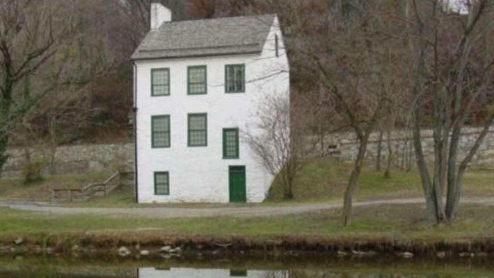 The Abner cloud House stands on the edge of the C & O Canal