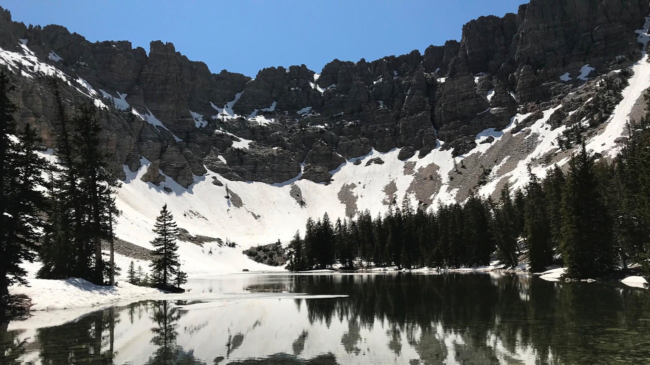 Mountain ridge partly covered in snow