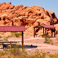 Picnic shelters in a red rock area