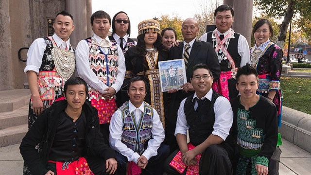 Participants at the 10th-annual Hmong New Year Celebration in downtown Chico, California, pose
