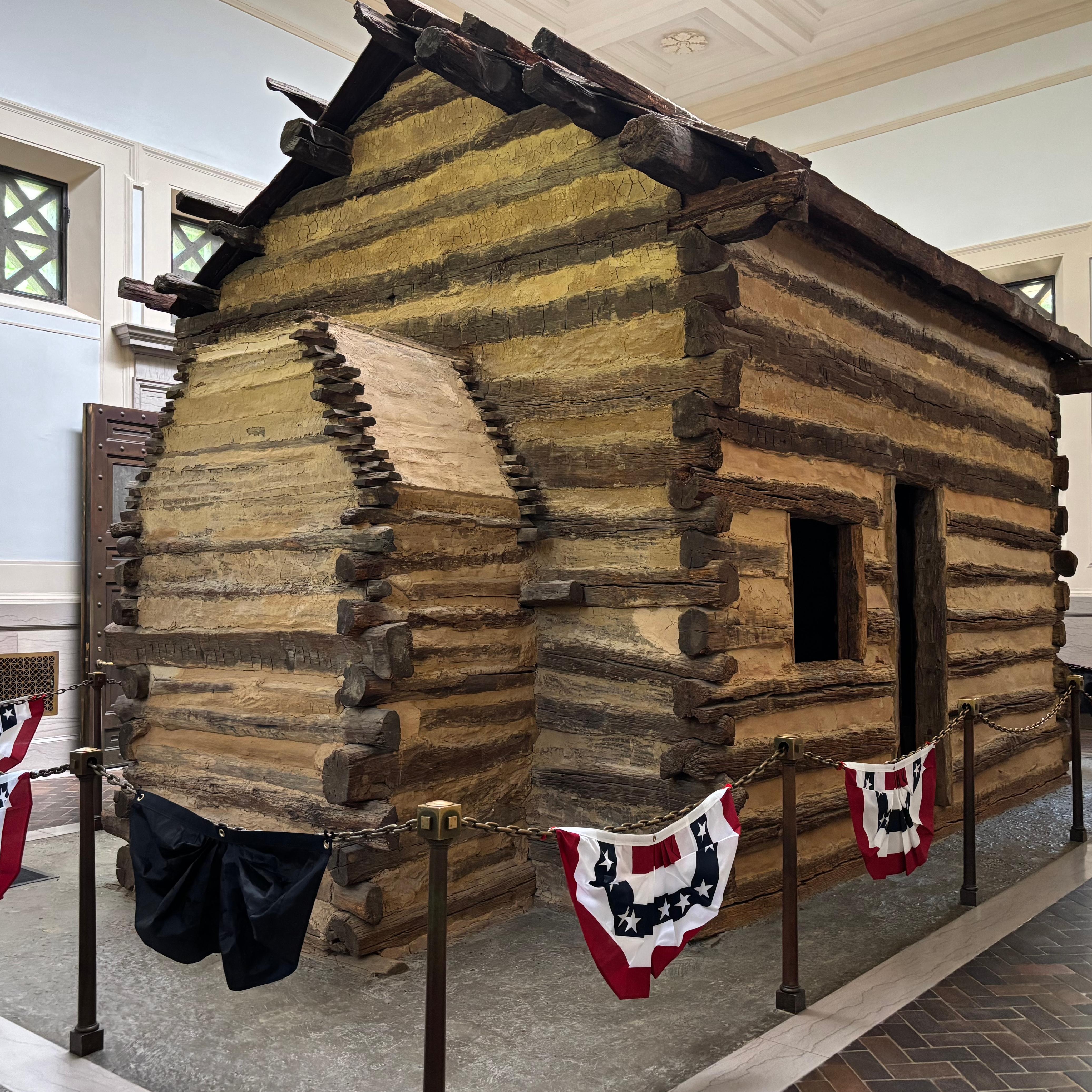 Wooden log cabin inside the Memorial Building