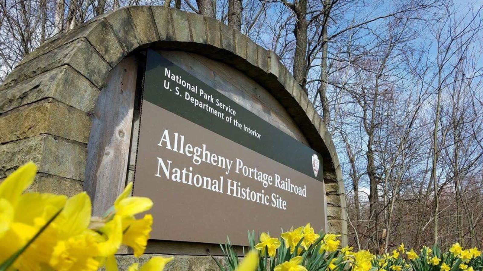 Park entrance sign with snow 