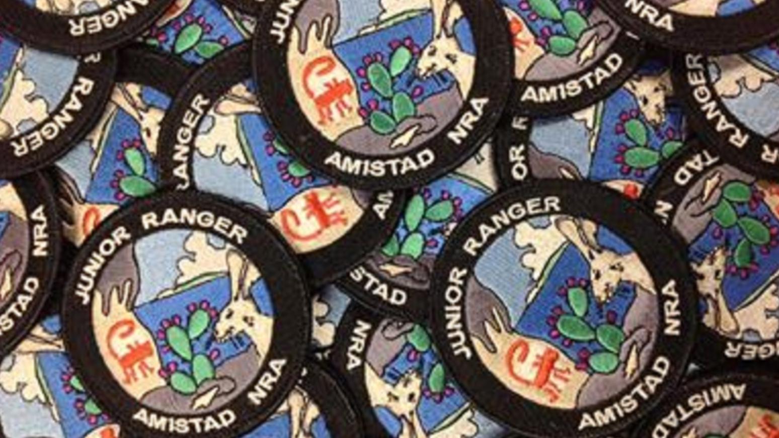 A pile of Amistad National Recreation Area Junior Ranger patches.