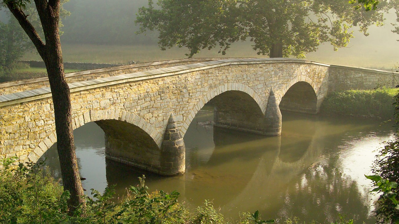 stone bridge over a creek 