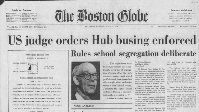 Newspaper headline about judge ordering school busing