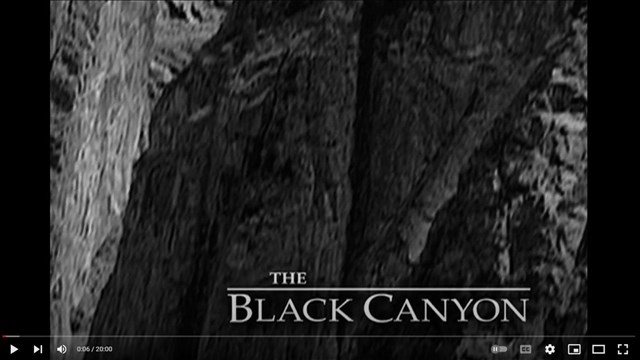 A screenshot of a dark canyon with 'Black Canyon' white text in the bottom right corner