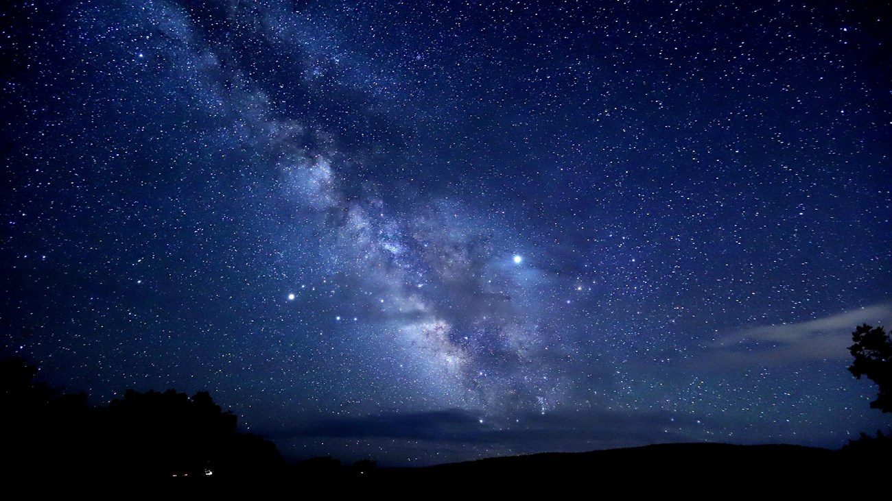 Milky Way with blue hues over a dark night sky