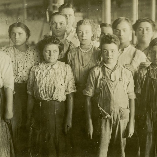 Group of child workers in mill