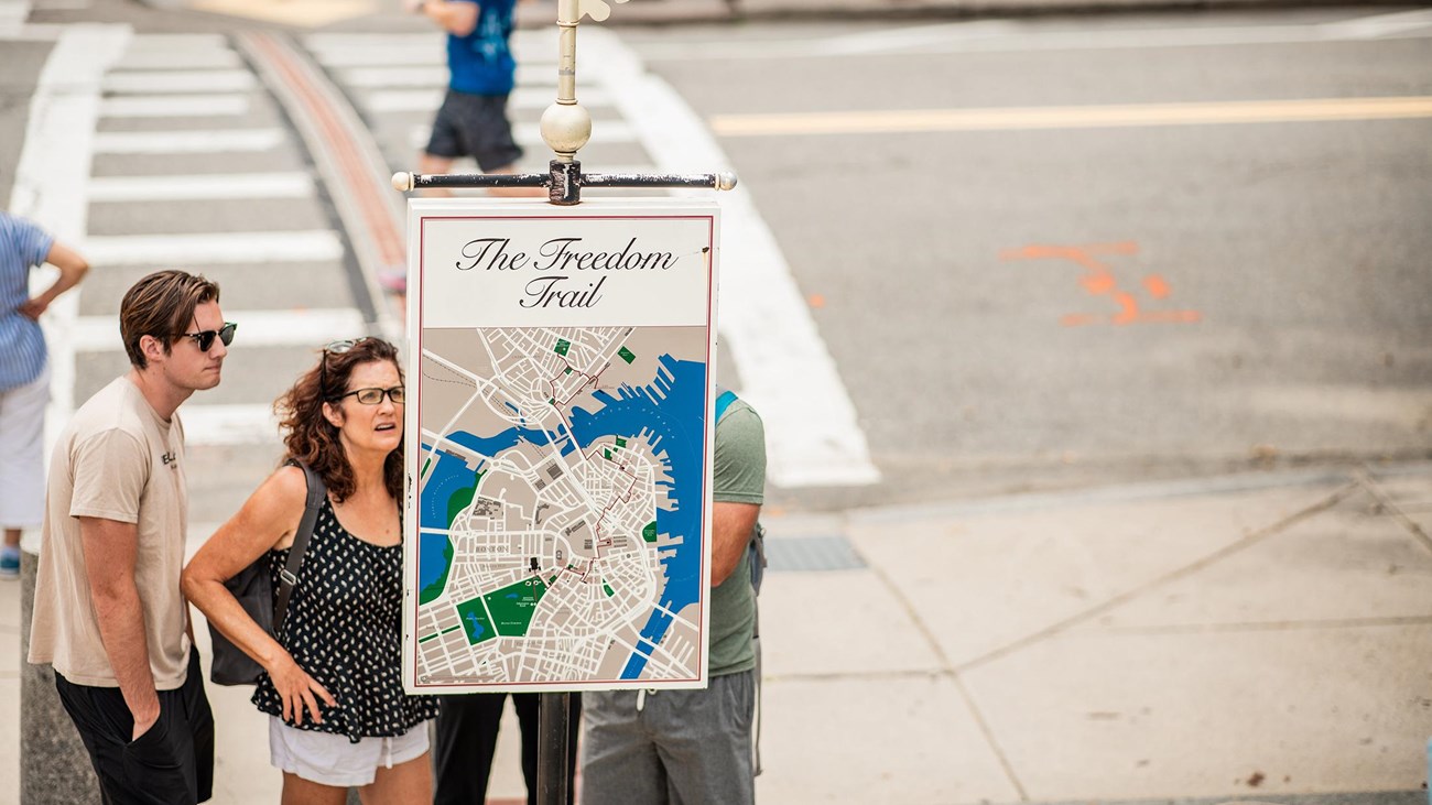 A view of Boston's skyline at daytime. White steeple of Old North in Center.