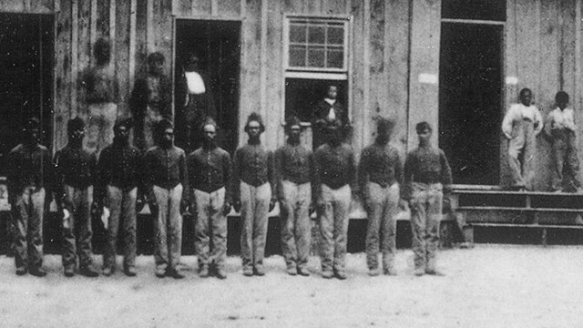 A group of formerly enslaved men who became soldiers at Camp Nelson