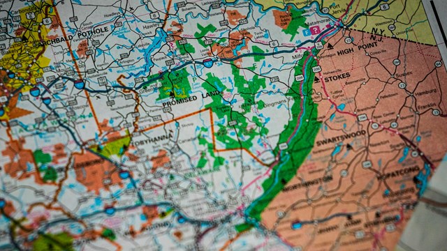 Picture of a standard road map with different colors signifying protected areas and towns. NPS Photo