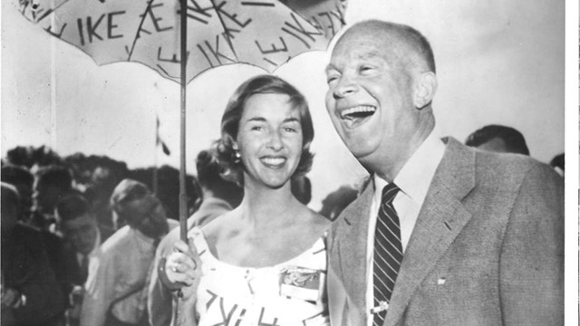 Black and white image of Eisenhower and a supporter