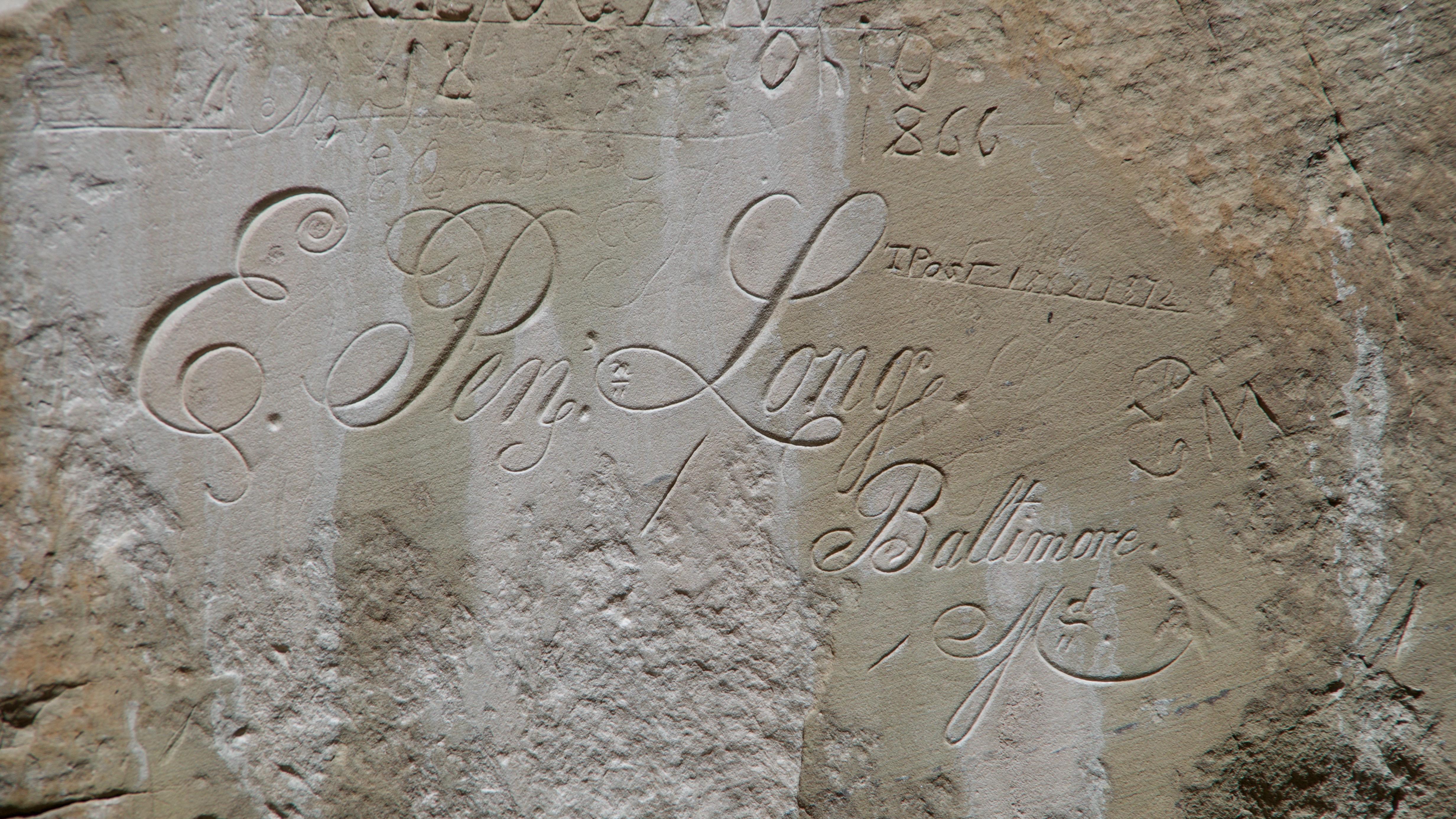 A calligraphy name inscribed on a rock