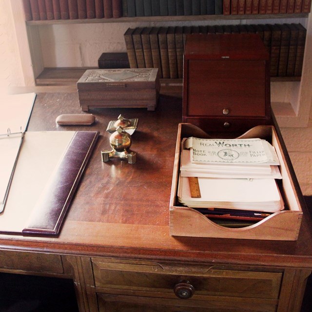 O'Neill's writing desk at Tao House, showcasing his papers, a typewriter.