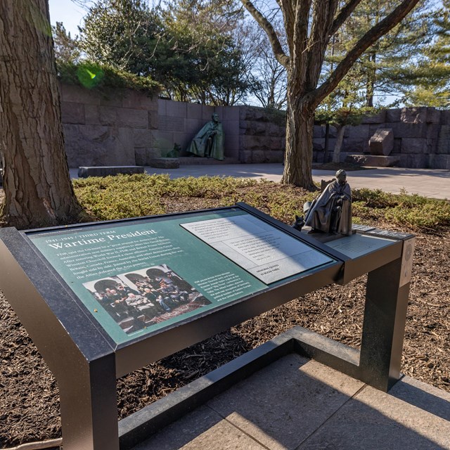 An exhibit with Braille and small 3D tactile model.
