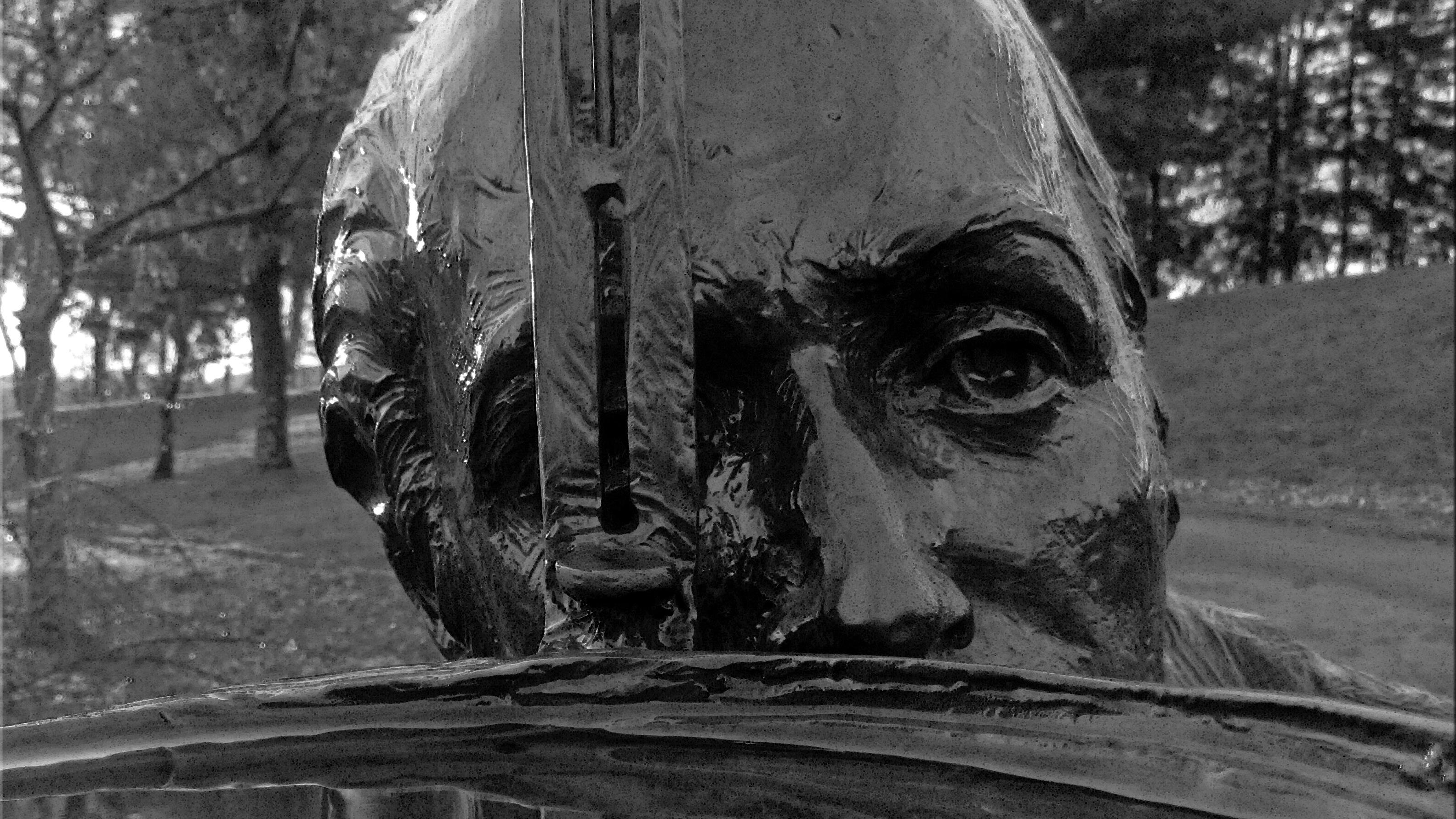 View of Albert Gallatin looking through a surveying instrument