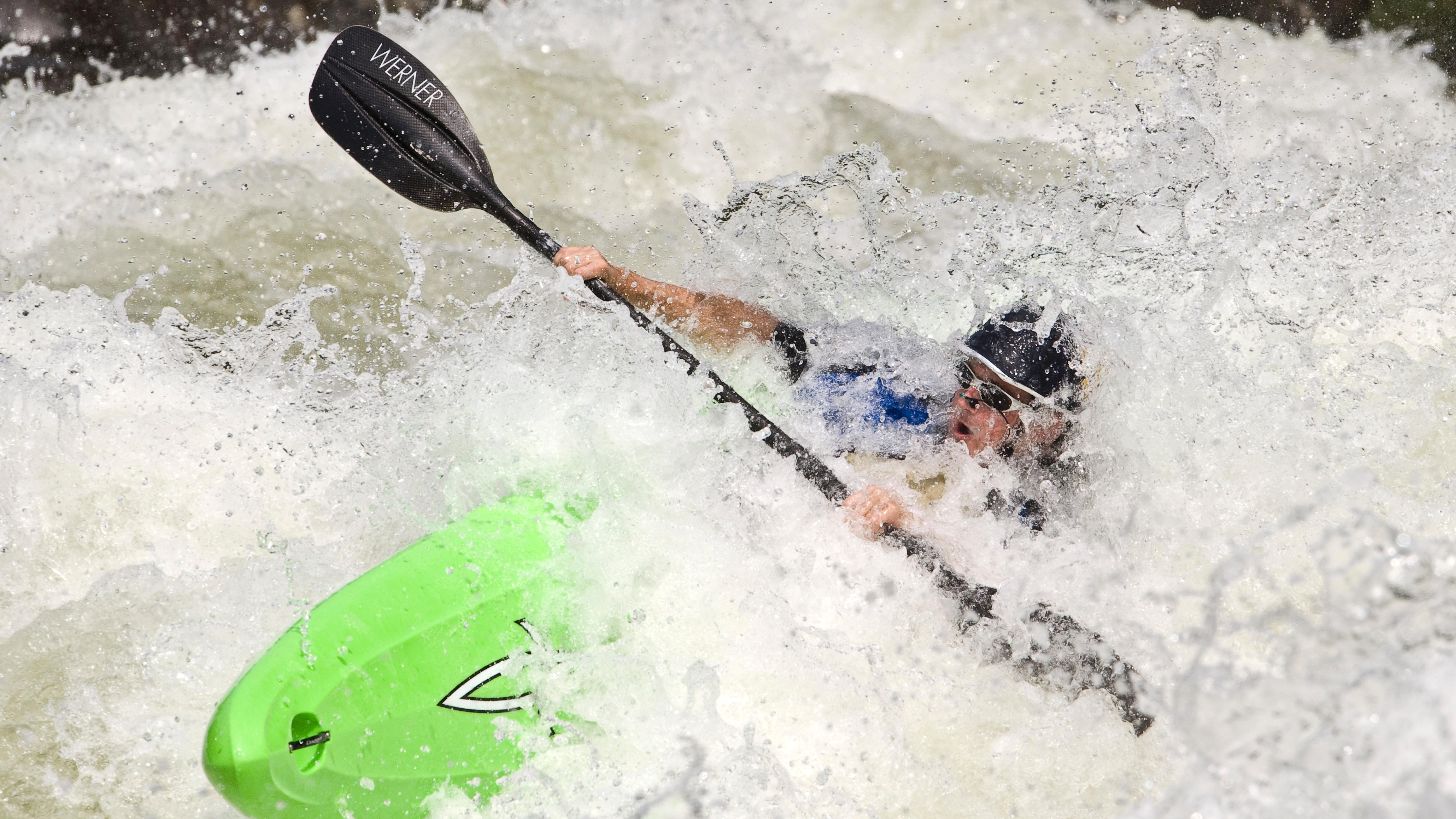 Kayaker paddling through a rapid on the Gauley River