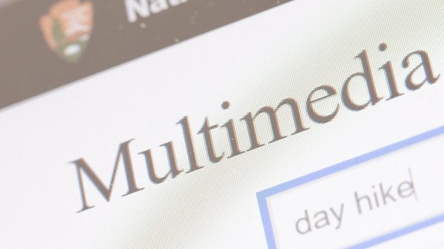 zoomed in macro photo of a video player on a screen