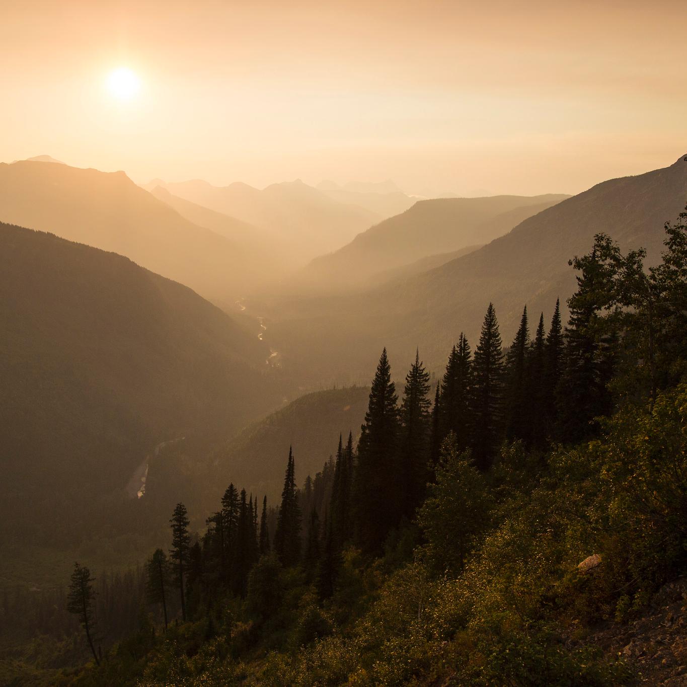 Sunset over a smoke-filled McDonald Valley