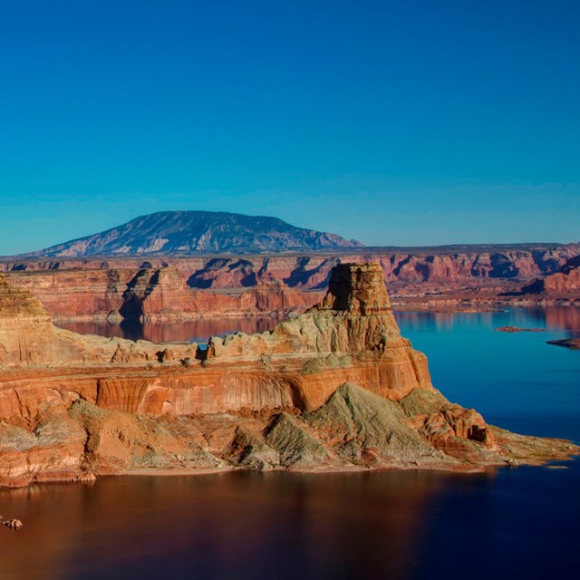 Sandstone buttes in a desert lake