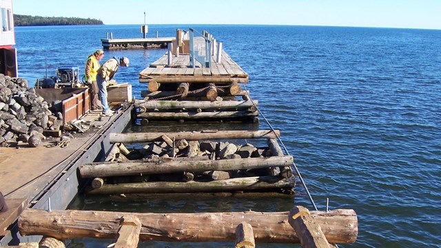 The wooden supports of a dock under construction.