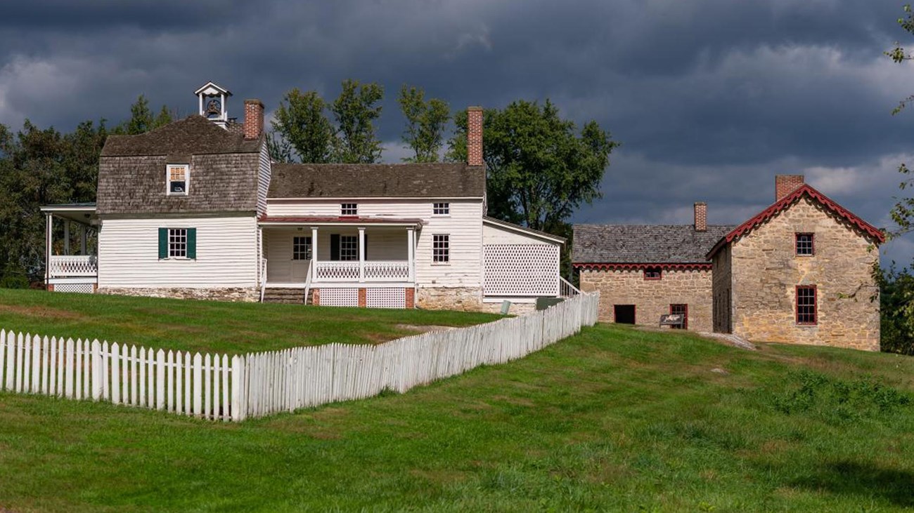 View of Hampton from the farm side. Overseer's House and Quarters of the Enslaved.